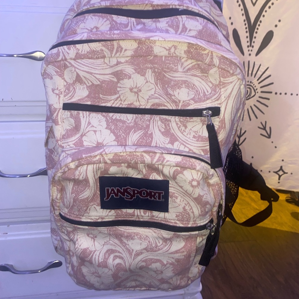 Pink flowery Jansport backpack